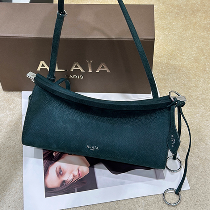 alaia small horizontal clip suede shoulder handbag